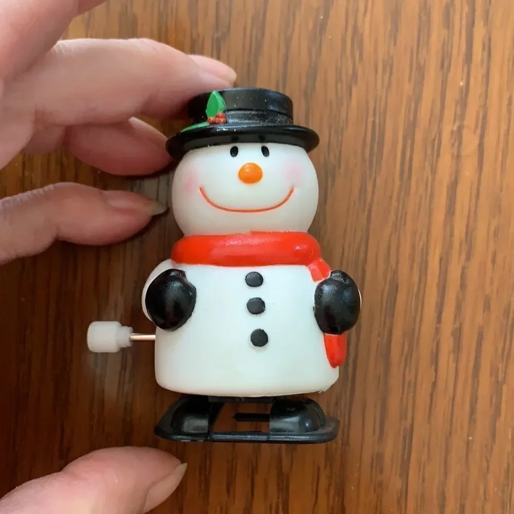 2 plastic wind up Christmas snowmen‎